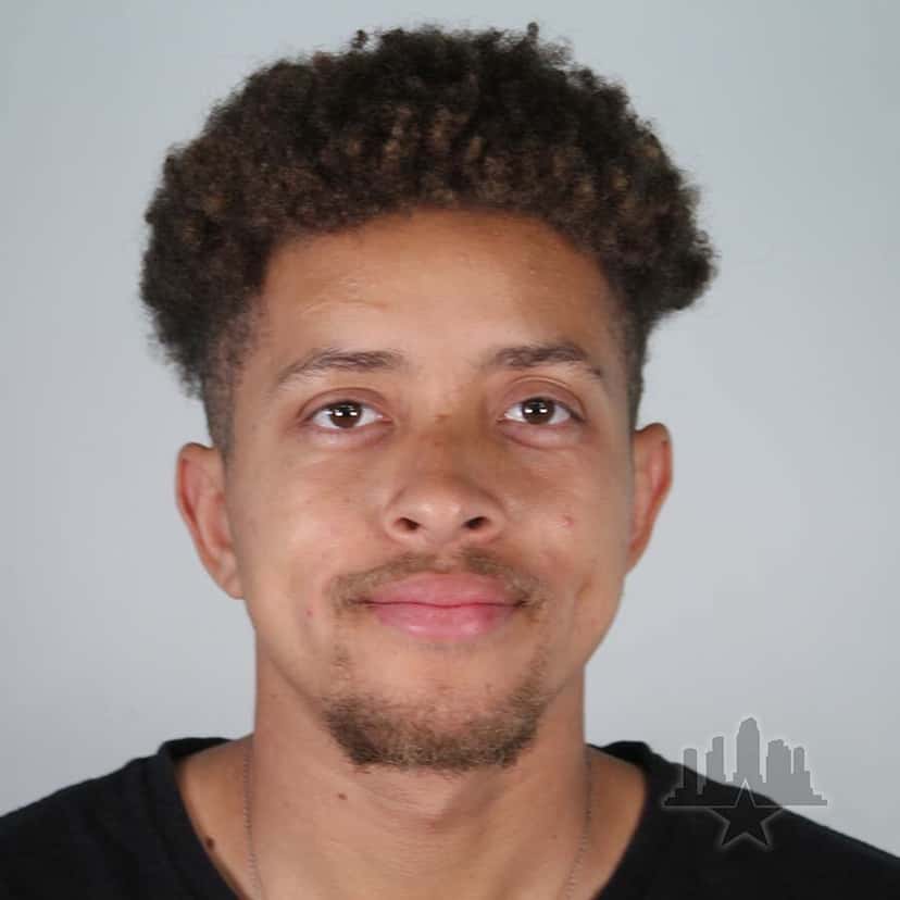 Retrato oficial de Luiz Coutinho, con remera negra, sobre fondo gris, del registro del Tampa Am 2026