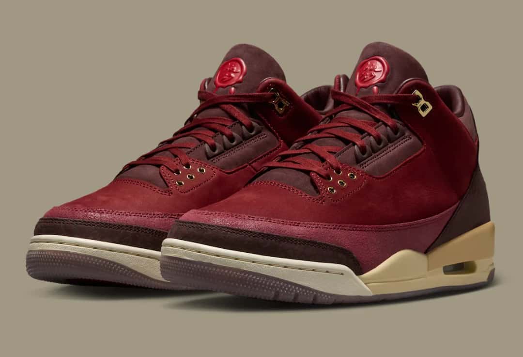 Vista detallada del Air Jordan 3 BIN 23 con sello de cera rojo y eyelets dorados