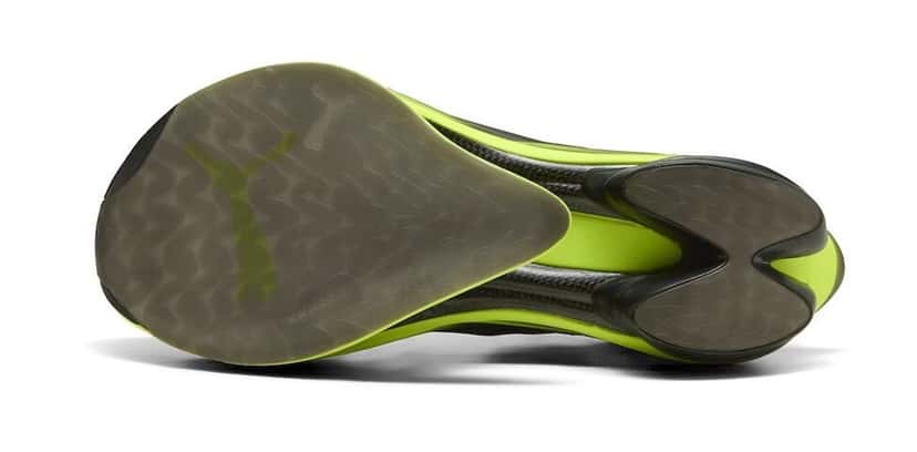 Suela de la Puma Fast-RB Nitro Elite 2 con goma translúcida verdosa y el logo de Puma en el centro