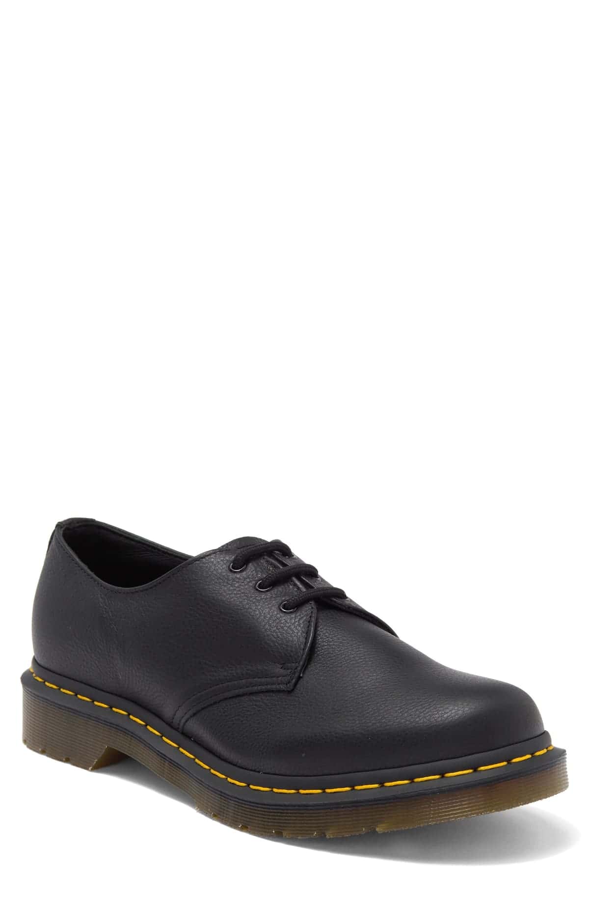 Zapato derby Dr. Martens 1461 de cuero negro granulado, con tres pares de ojales, costura amarilla y suela translúcida